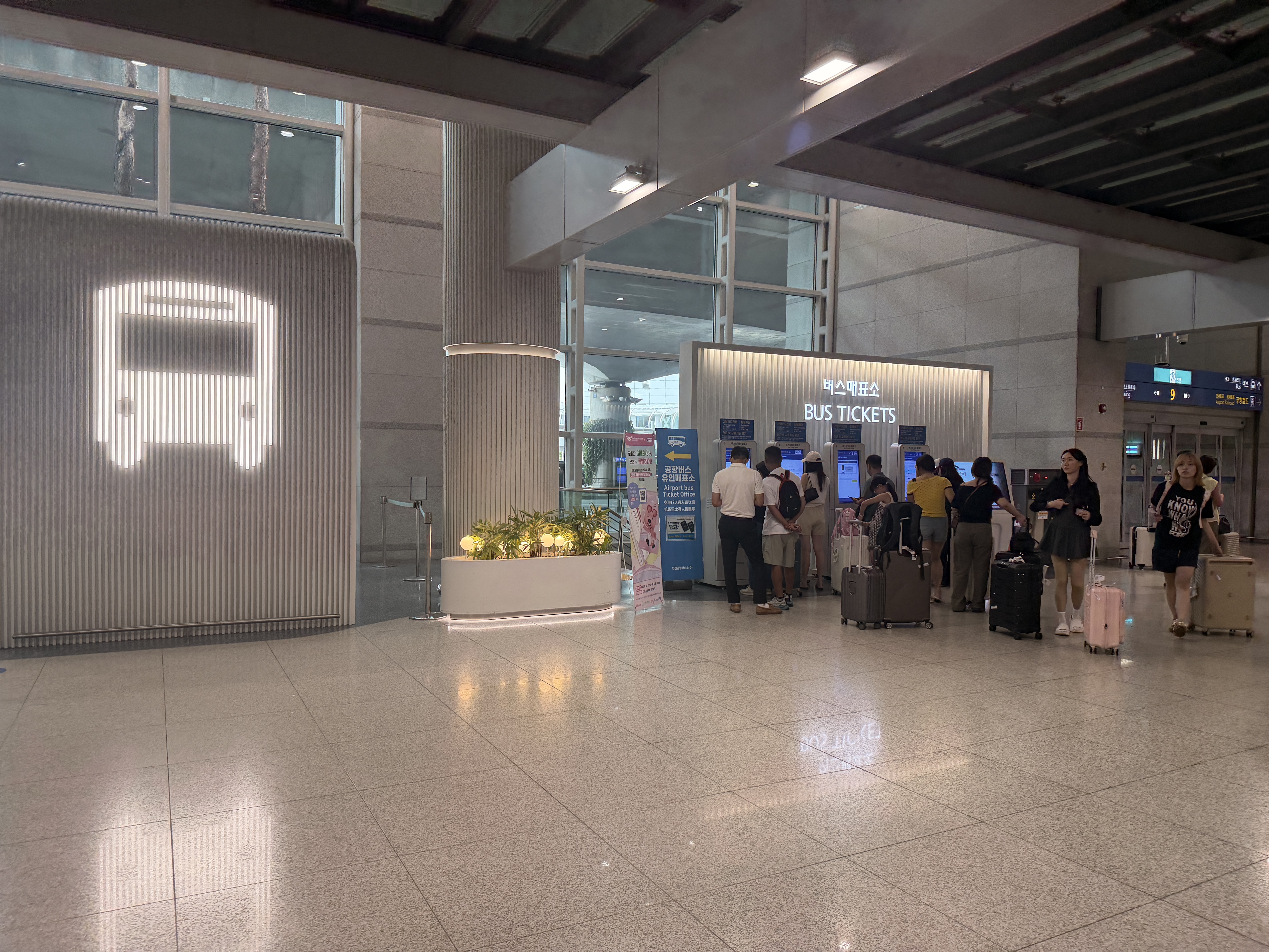 Bus ticket kiosk line at Incheon Airport