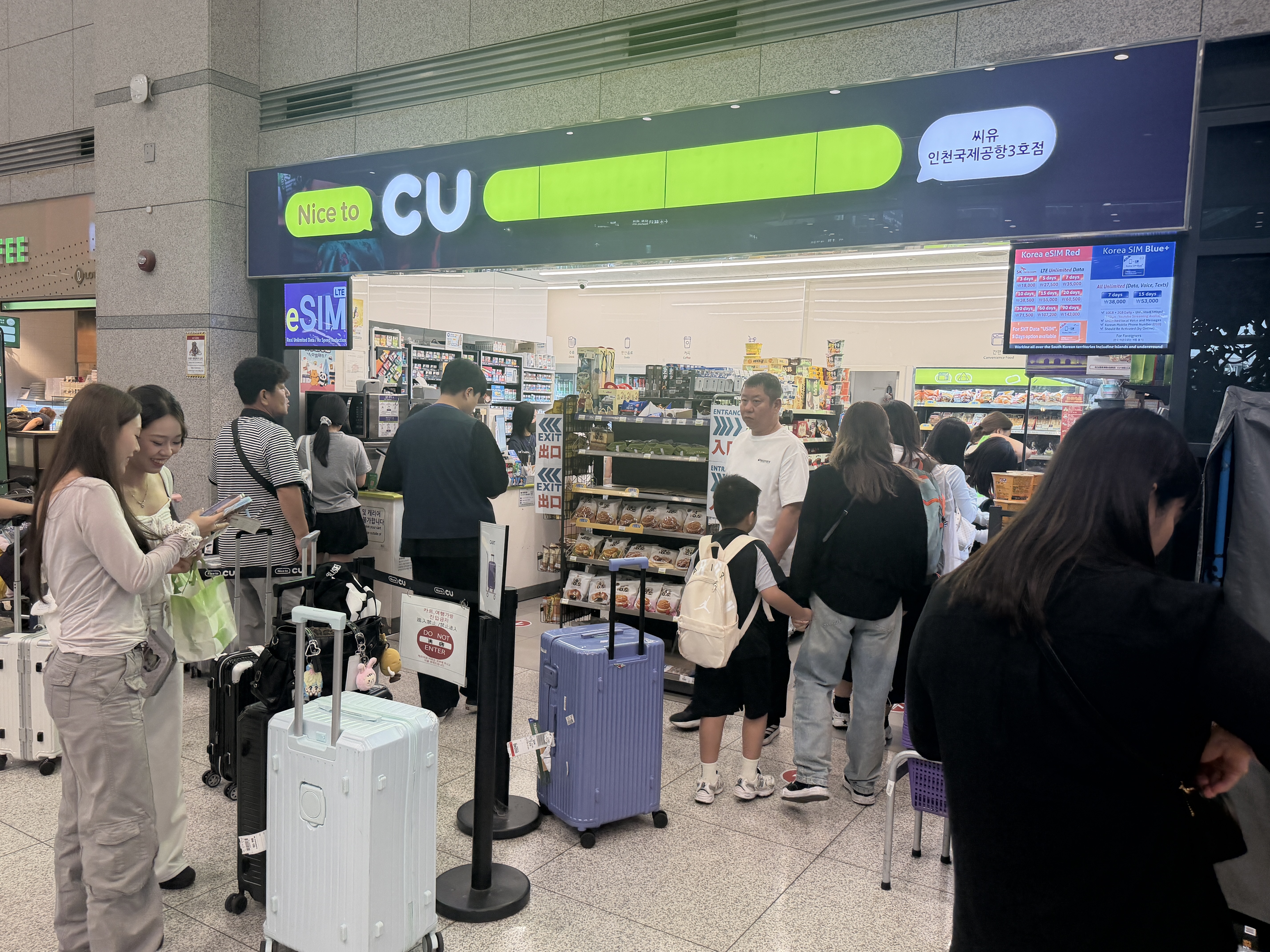 CU storefront with Korea eSIM signage at Incheon Airport