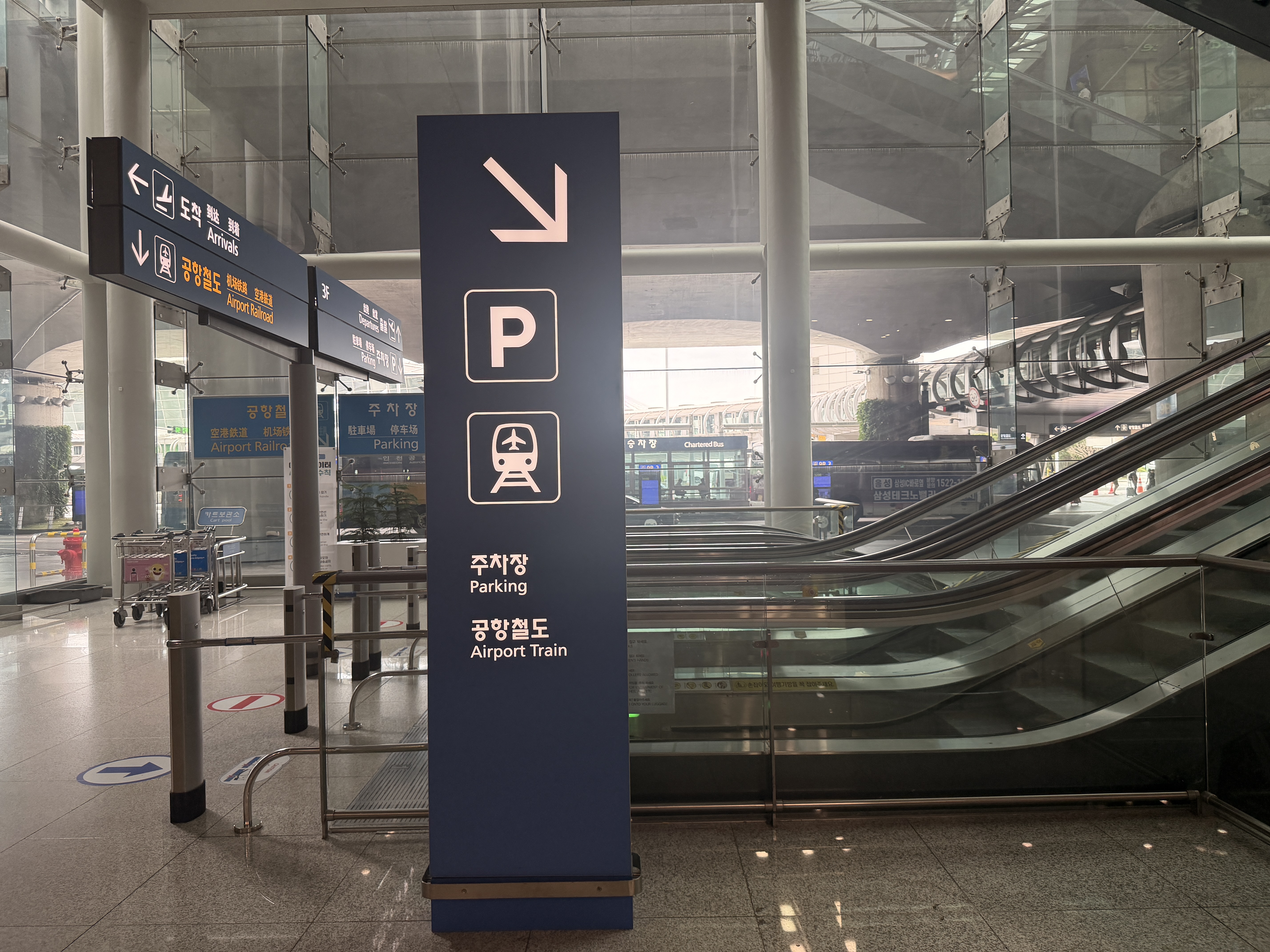 Parking and Airport Train directional sign at Incheon Airport