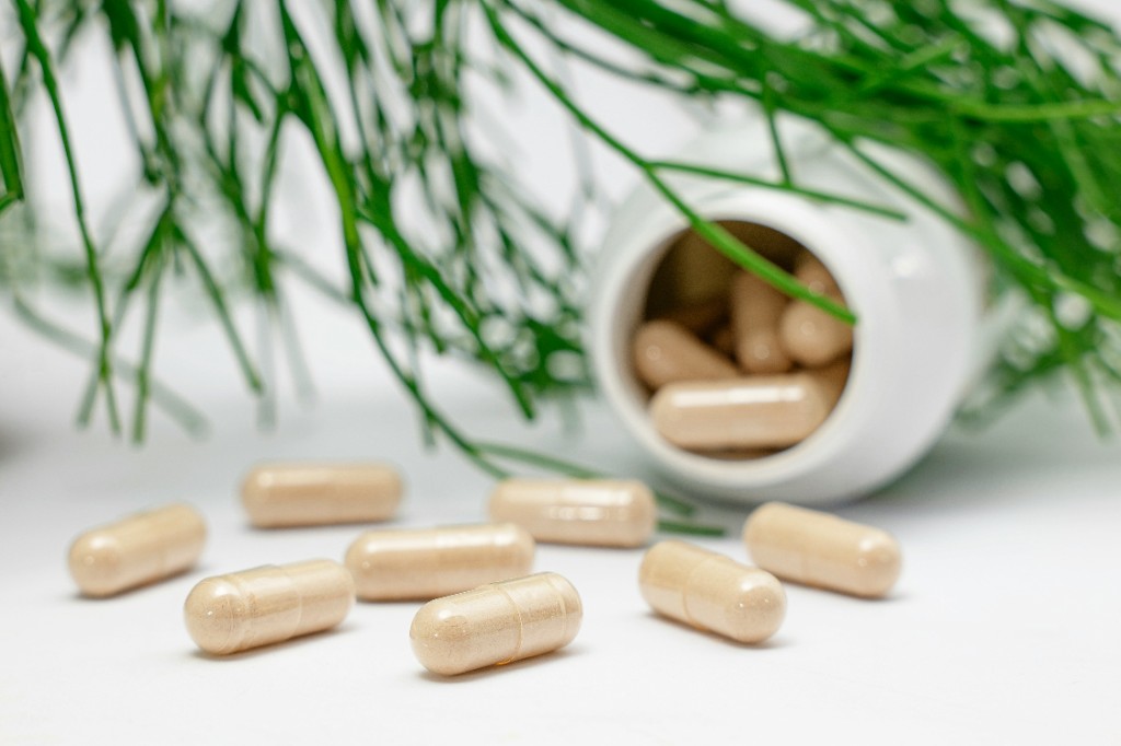 Supplement capsules — NMN and niacinamide are both sold as NAD+ support products, but they are not interchangeable